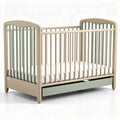 Wooden convertible crib with removable mattress and sage green accents 130 x 70 x 90cm